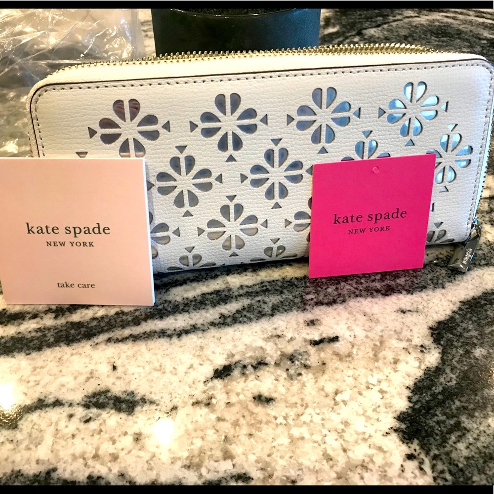 NWT Kate Spade White Wallet with cut outs